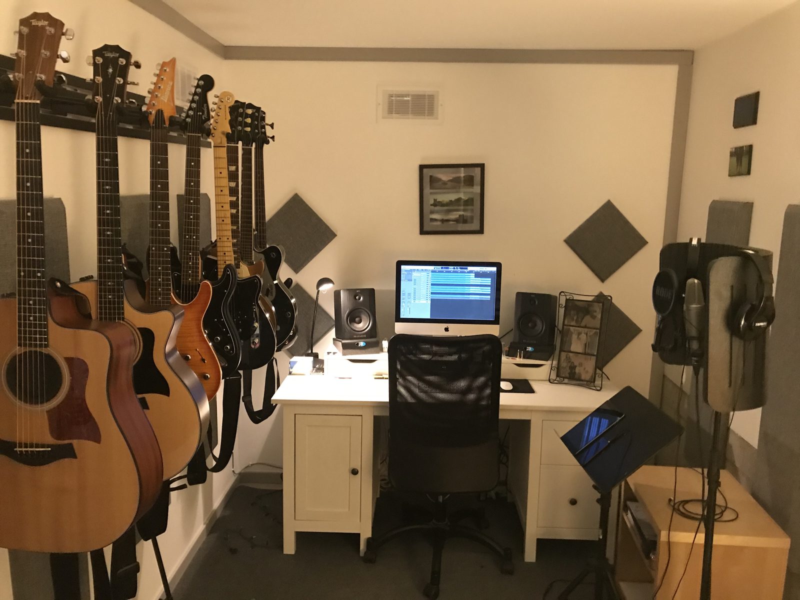 Jim Rhodes' home recording studio, guitars on the wall